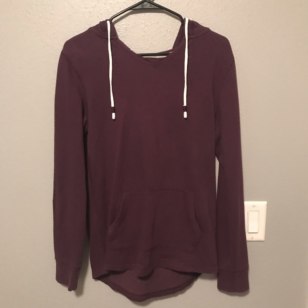 Plum colored sweatshirt.